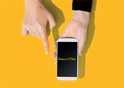 Person using a white smartphone